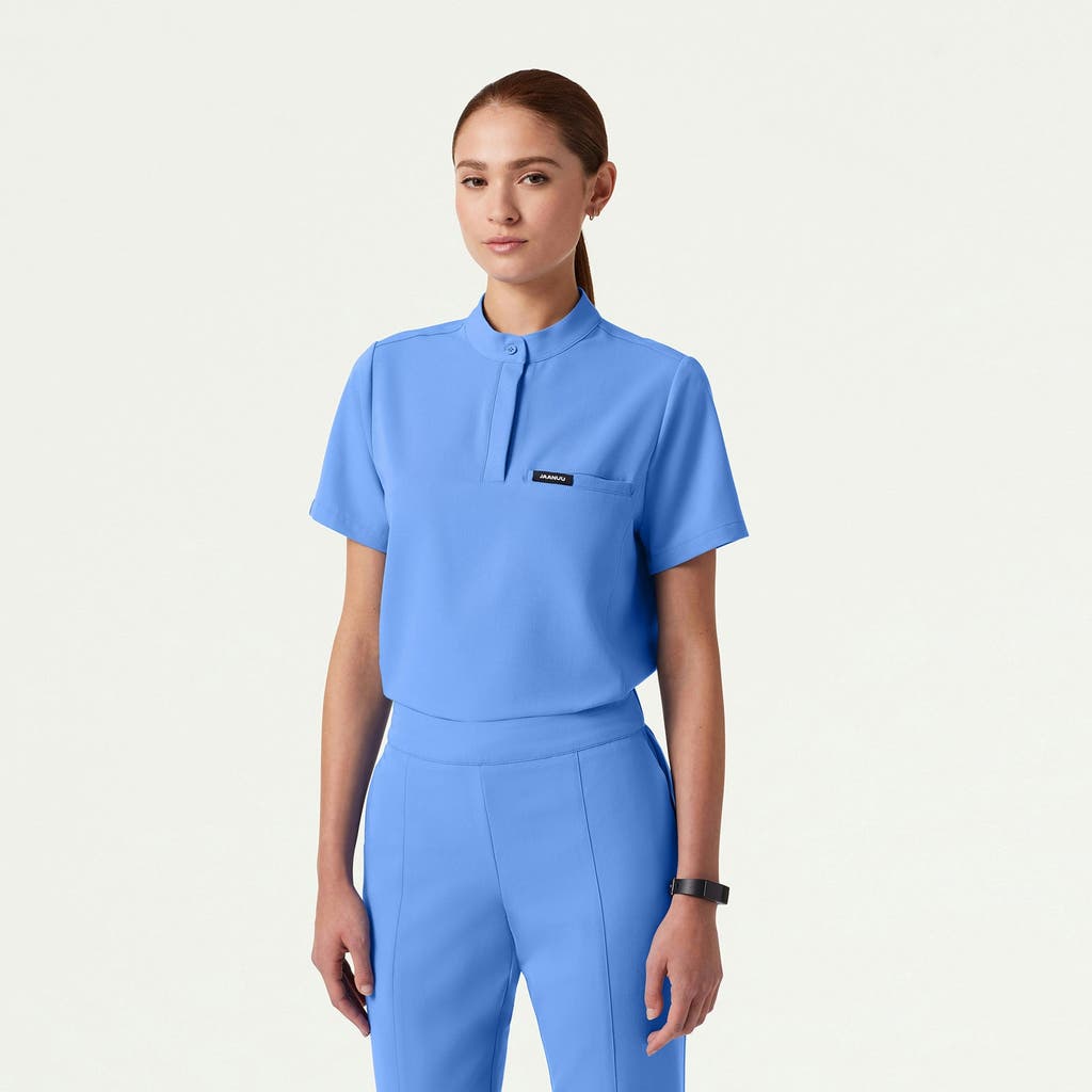 Jaanuu 1-pocket Classic Banded Collar Scrub Top In Blue