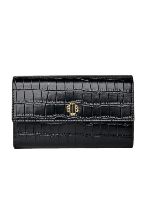 Croc-effect embossed leather bag