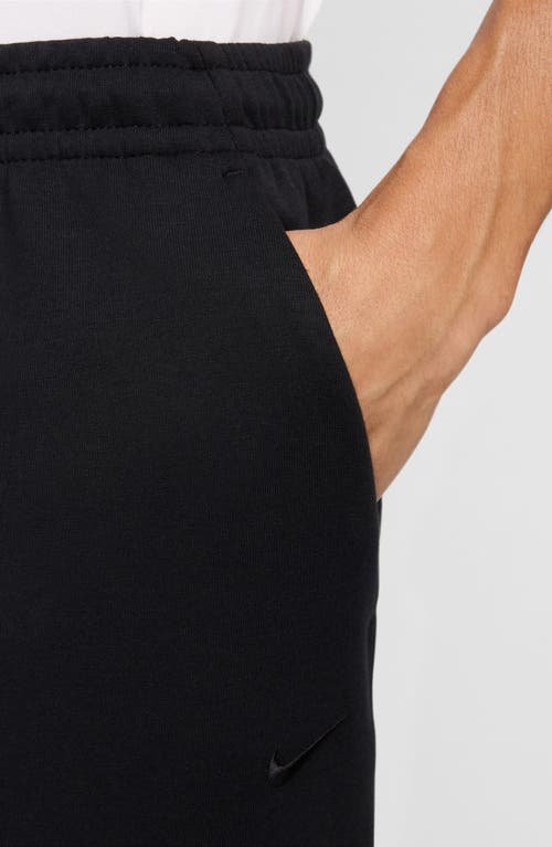 Nike Primary Fleece Dri-fit Uv Tapered Performance Pants In Black