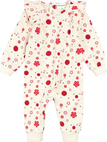 A white baby romper with a red floral design