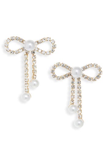 Cara Crystal Bow Earrings In Gold