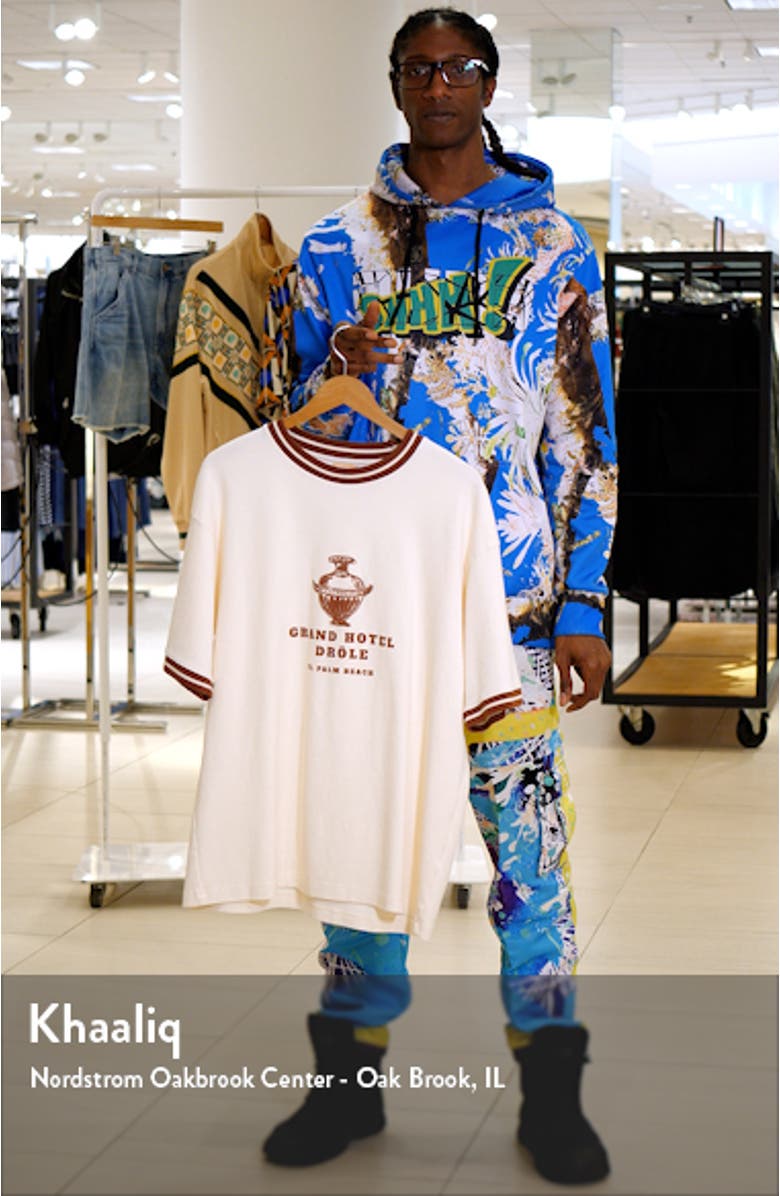 x Gergei Erdei Hôtel Drôle Graphic T-Shirt, sales video thumbnail