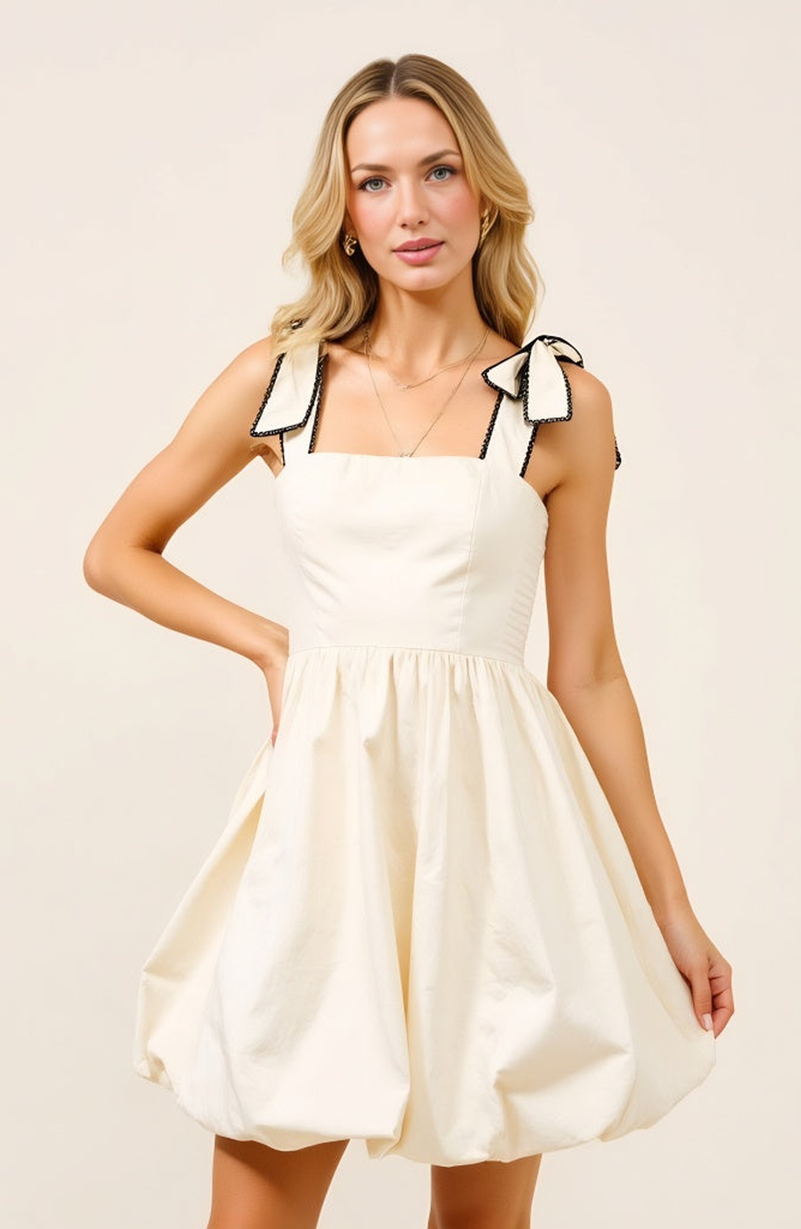 Modenaire Bow Strap Bubble Hem Mini Dress with Square Neckline Detail in Off-White /Cream 