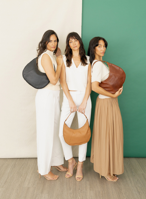 Deux Mains Saddle Shoulder Bag In Brown