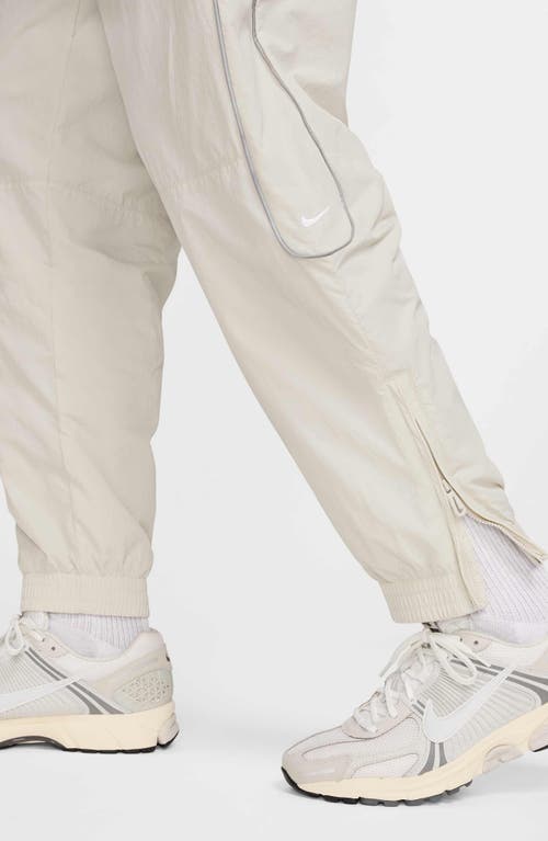 Nike Men's Solo Swoosh Track Pants In Light Bone/white