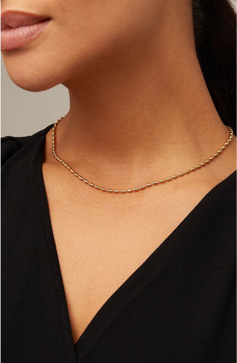 18K gold-plated chain with thin oval links and carabiner clasp