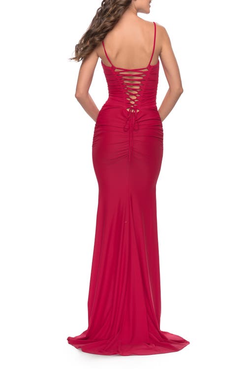La Femme Intricate Lace Up Back Jersey Gown With Ruching In Red