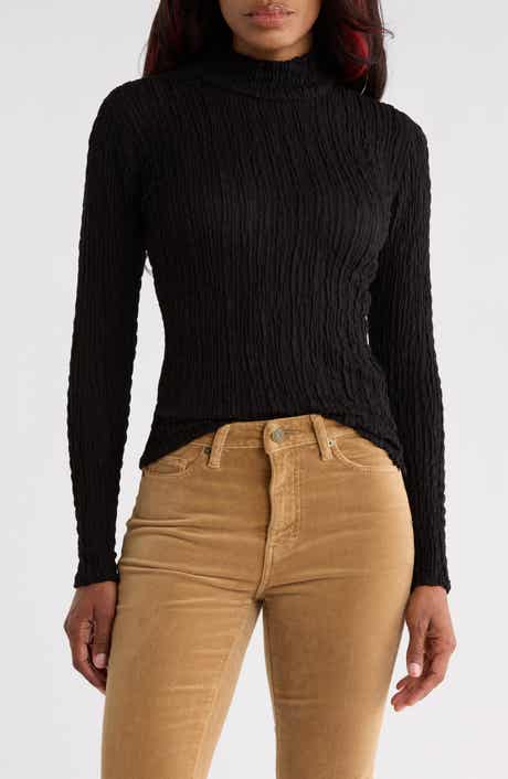 The Mesh Turtleneck Sweater
