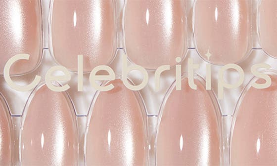 selected SHE WEARS CRYSTALS ON HER NAIL
