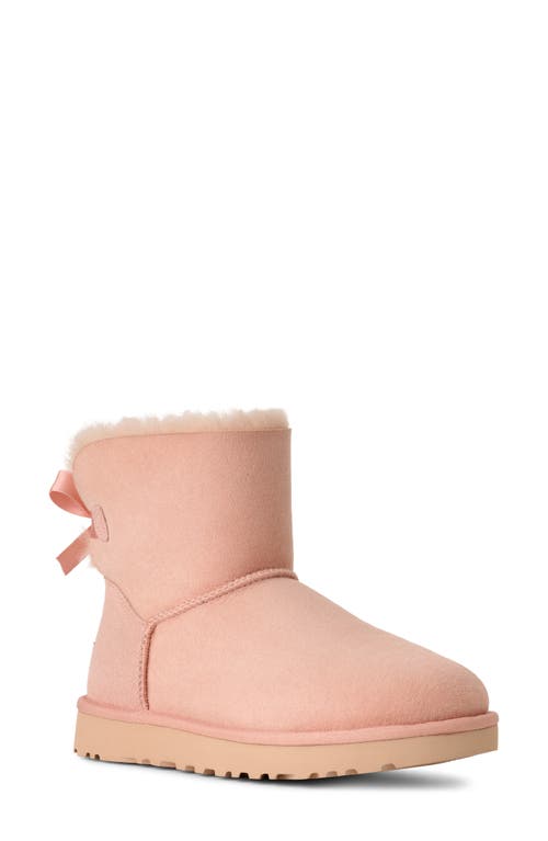 Ugg(r) Mini Bailey Bow Ii Genuine Shearling Bootie In Pink