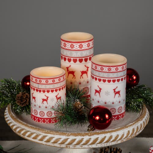 Northlight Led Flameless Flickering Nordic Reindeer Wax Pillar Christmas Candles In Pink