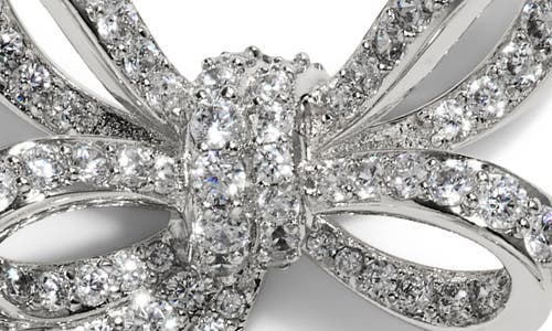 Nadri Le Bisou Pave Bow Stud Earrings In Metallic