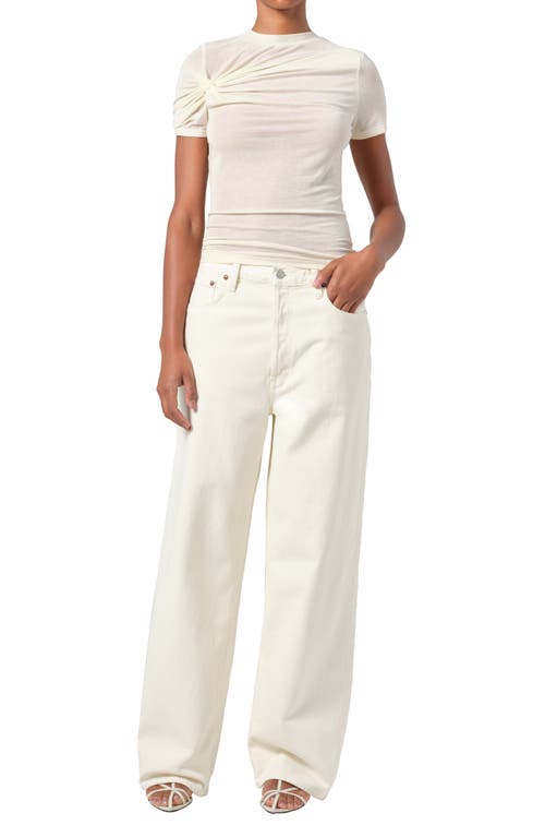 Shop Agolde Low Slung Baggy Jeans In Solar