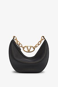 A black hobo bag with a goldtone chain and logo hardware.