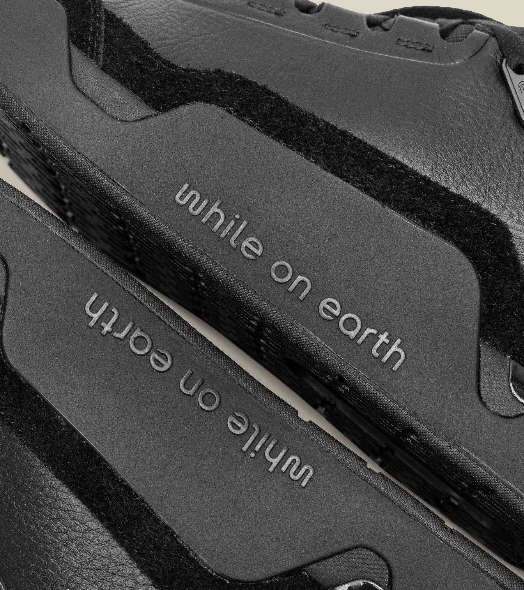 while on earth<sup>™</sup> Leather Trainer, Alternate, color, Black