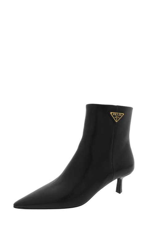 ショートブーツ・ブーティ PRADA WHITE LEATHER ANKLE BOOTS Chocolate leather-trimmed ankle boots in white - Prada