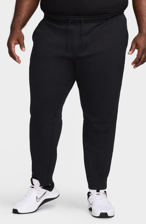 Nike Primary Fleece Dri-fit Uv Tapered Performance Pants In Black