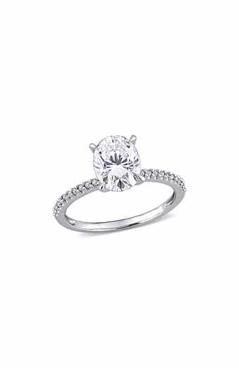 DELMAR 14K White Gold Oval Lab Created Moissanite & Diamond Ring - 0.11ct.