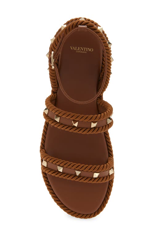 Valentino Garavani Rockstud Ankle Strap Flat Sandal In Tabacco