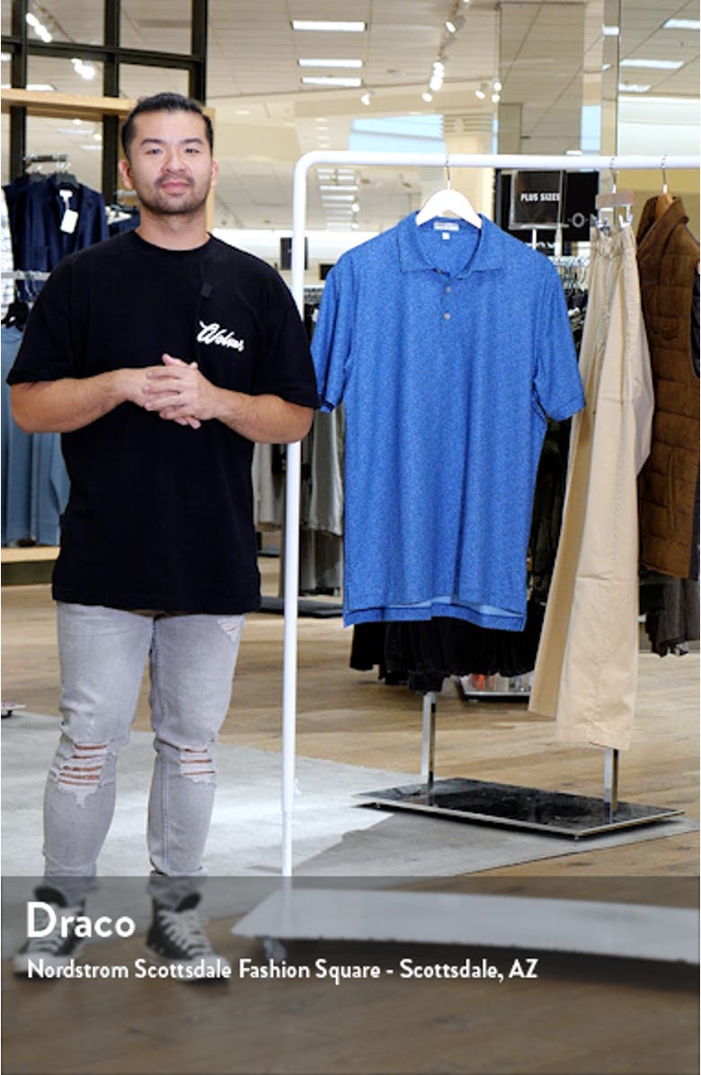 Luck of the Irish Clover Print Performance Golf Polo, sales video thumbnail