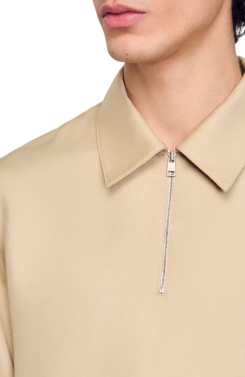 Sandro Zip-neck Polo Shirt In Sand.
