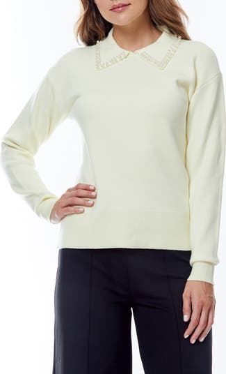 White store sweater blouse with pearls