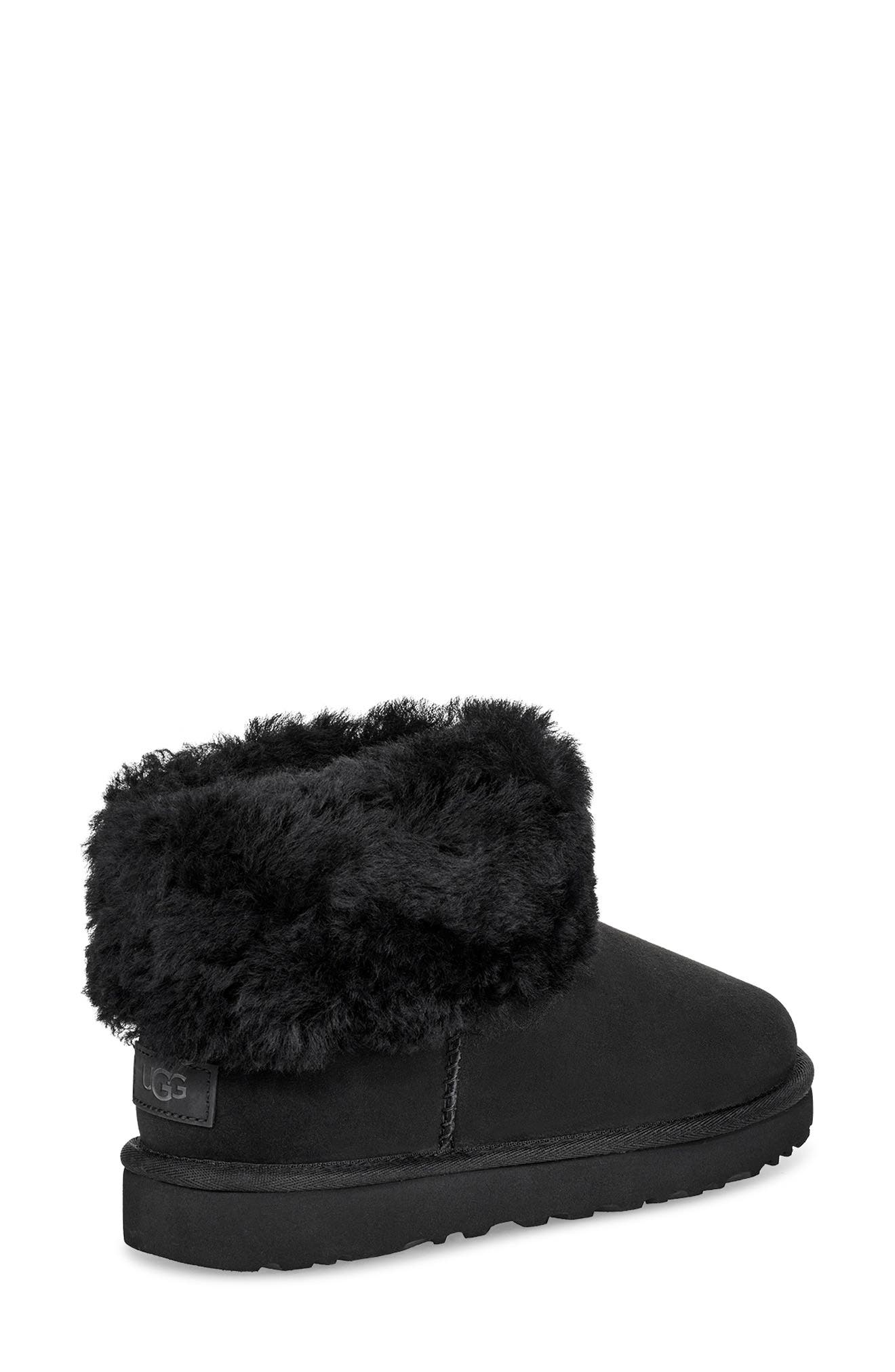 UGG Classic Mini Fluff Genuine Shearling Bootie, Alternate, color, BLACK