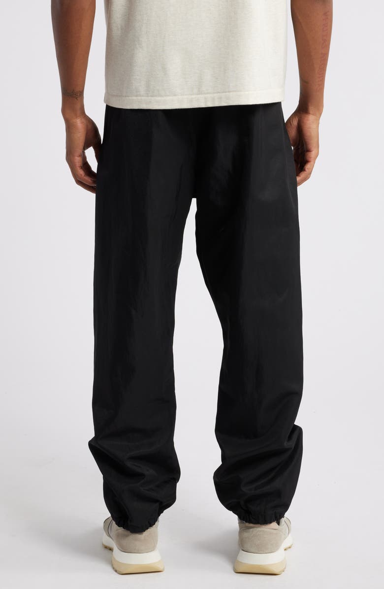 Fear of God Essentials Gender Inclusive Textured Nylon Track Pants, Alternate, color,