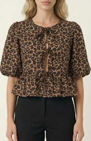 Modenaire Peplum Top With Front Tie Closures And Short Puff Sleeves