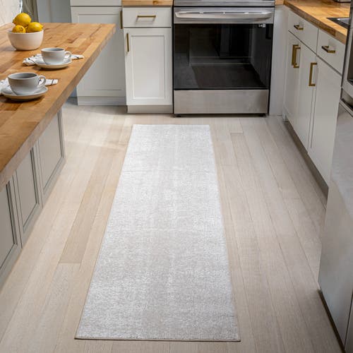 Shop Jonathan Y Haze Solid Low-pile Area Rug In Eggshell/ivory