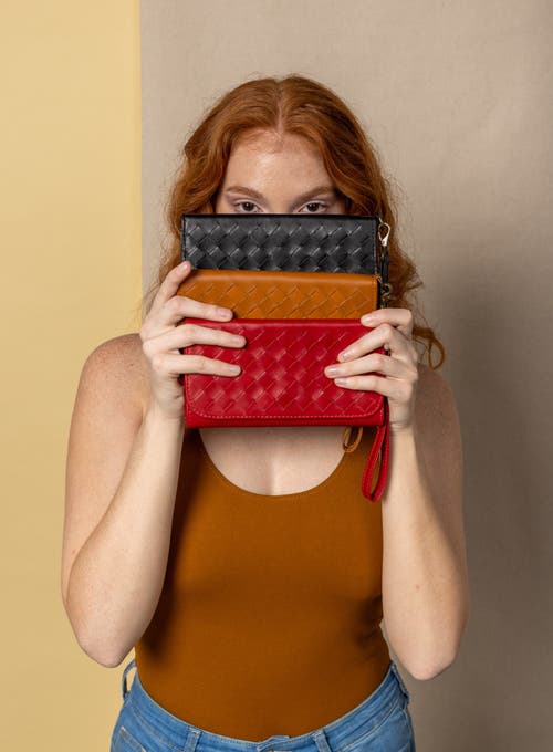 Deux Mains Woven Wristlet Wallet In Orange