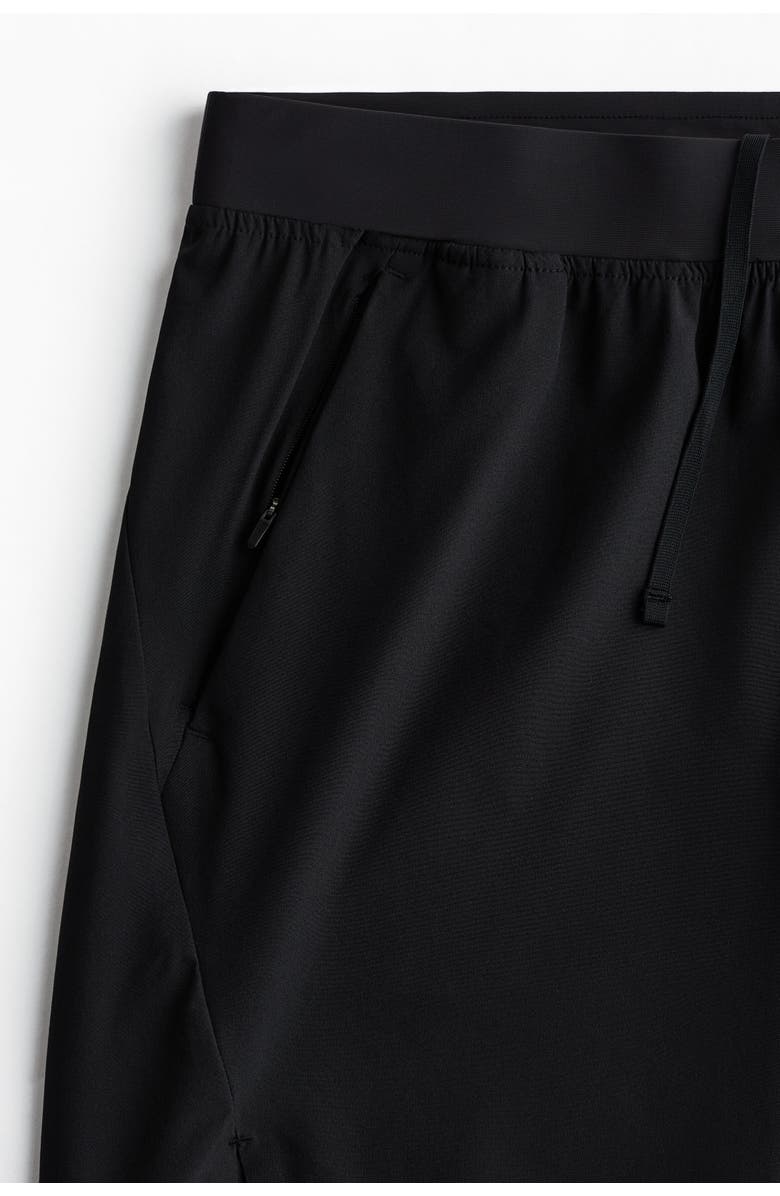 H&M Mid-length sports shorts with drymove, Alternate, color, Black