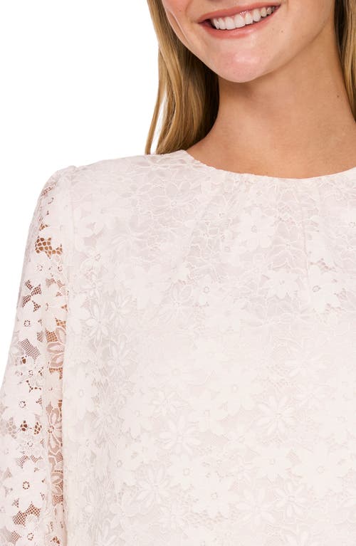 Shop Cece Floral Lace Long Sleeve Ruffle Cuff Top In New Ivory
