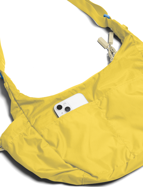 Baboon To The Moon Crescent Crossbody Bag In Orange