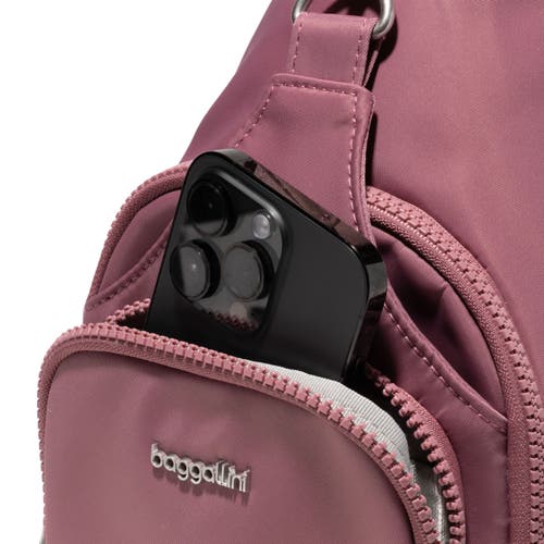 Baggallini Central Park Sling Bag In Mauve Twill