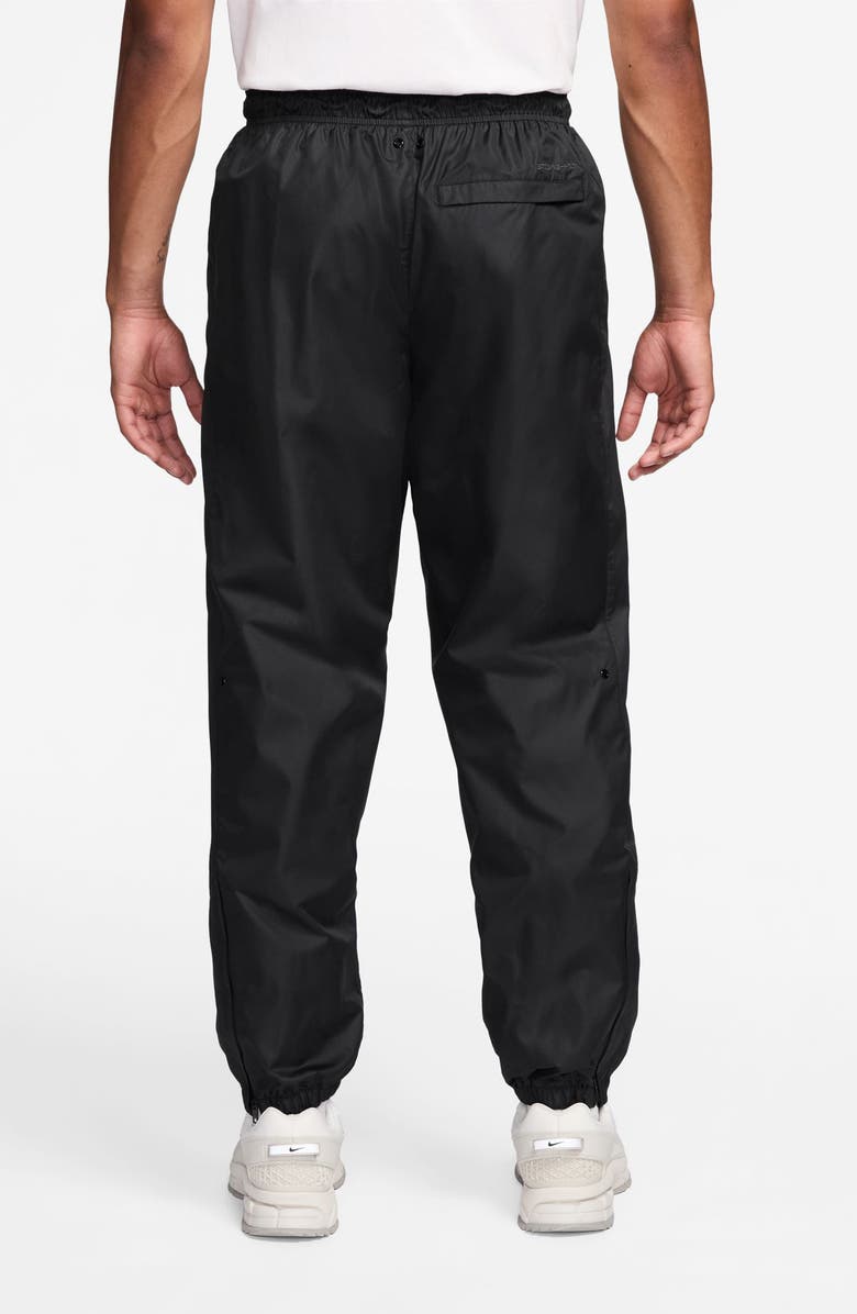 Nike Windrunner Water Repellent Track Pants, Alternate, color, Black/ White