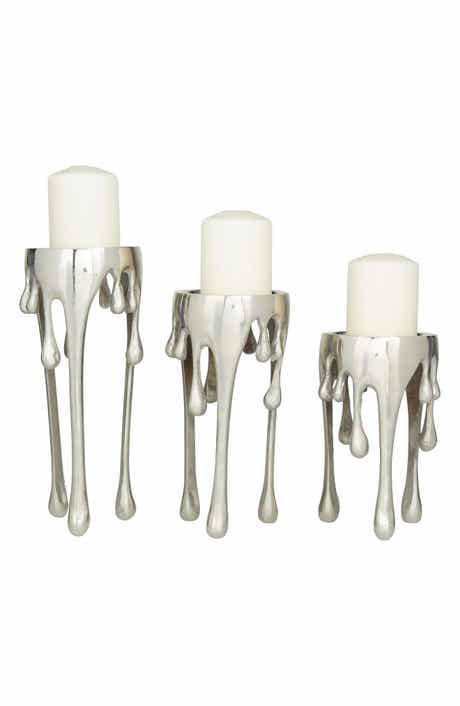 UMA Set of 3 Melting Wax Pillar Candleholders