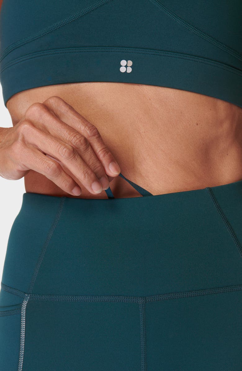 Sweaty Betty Therma Boost Pocketed 7/8 Running Leggings, Alternate, color, Deep Green