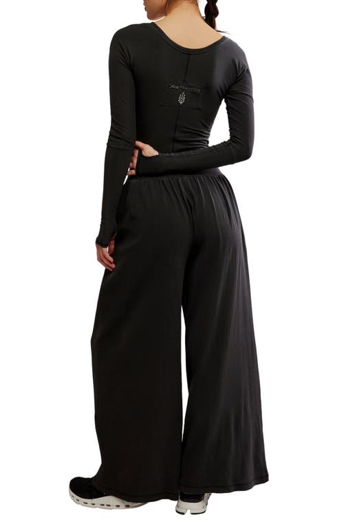 Free People Fp Movement Hot Shot Wide Leg Long Sleeve Jumpsuit In Black