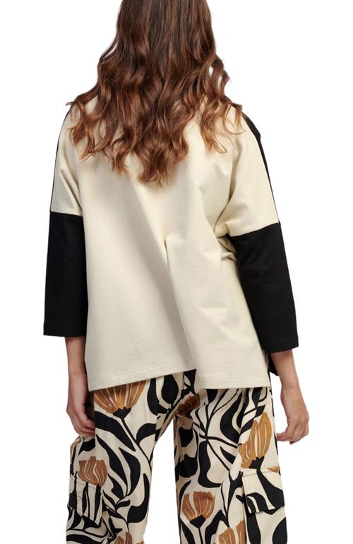 Alembika Boxy Tee With Contrast Tulip Print Patch Pocket In Black