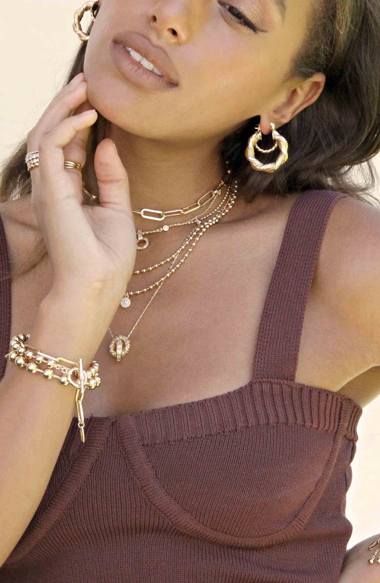 Ettika Textured Huggie Hoop Earrings, Alternate, color, Gold