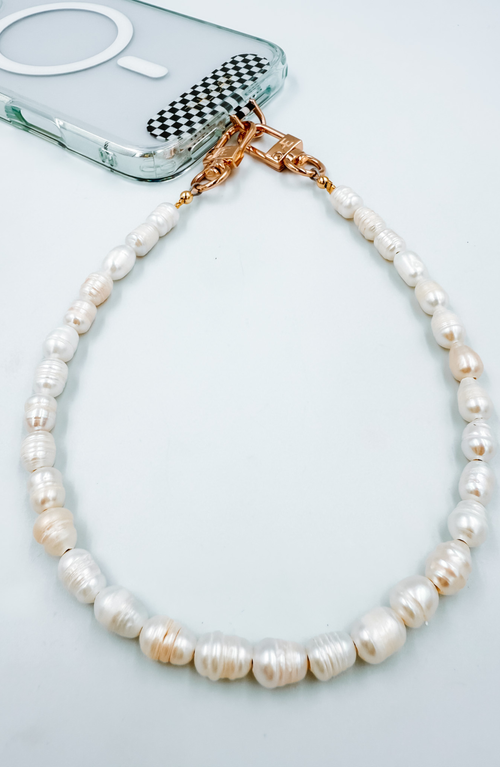 The Cæp Universal Wristlet In White