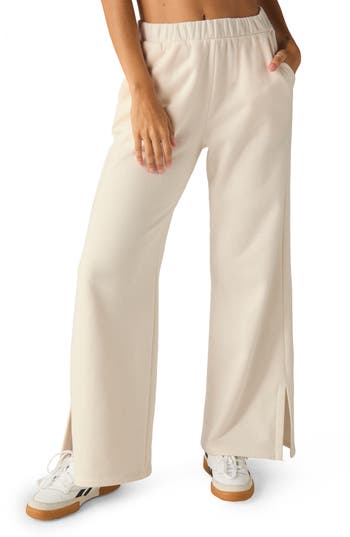 Beyond Yoga Open Ended Mid Rise Wide Leg Pants In White