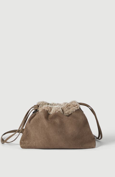Pouch bag in sparkling textured leather with merino shearling lining and monili