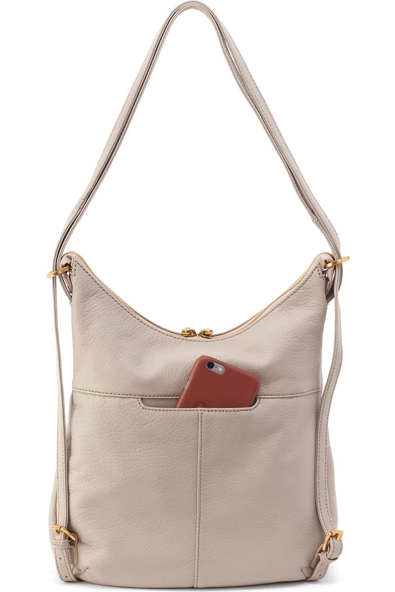 cream colored leather converible backpack purse ALTOSY Genuine for Women with Buckle Flap Convertible Leather Backpack Coconut Cream Meet your new go Merrin Convertible Backpack - Taupe
