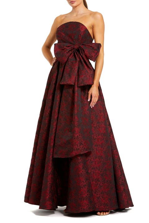 Strapless Floral Brocade Evening Gown with Bow Detail