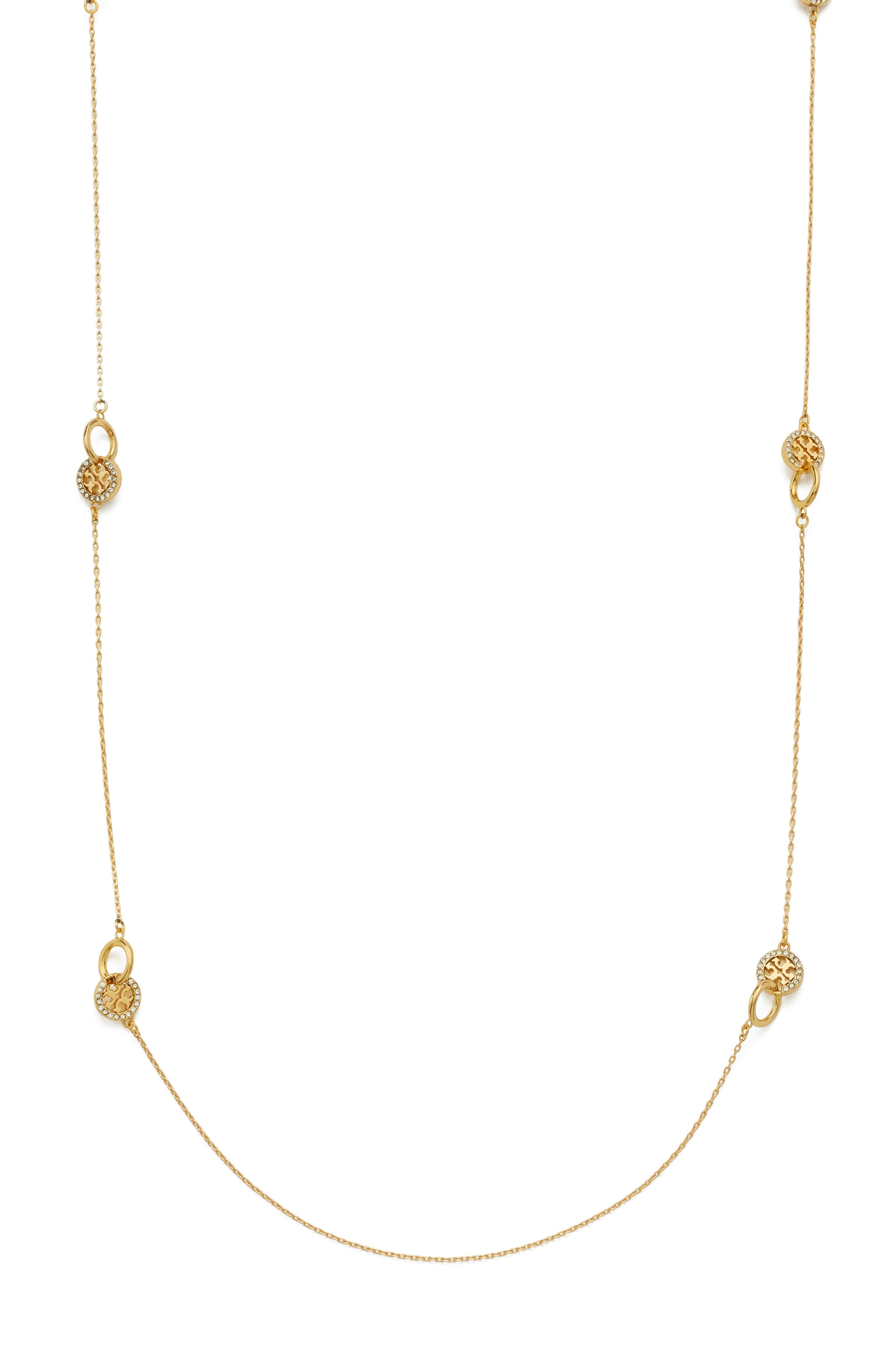 selected TORY GOLD / CRYSTAL