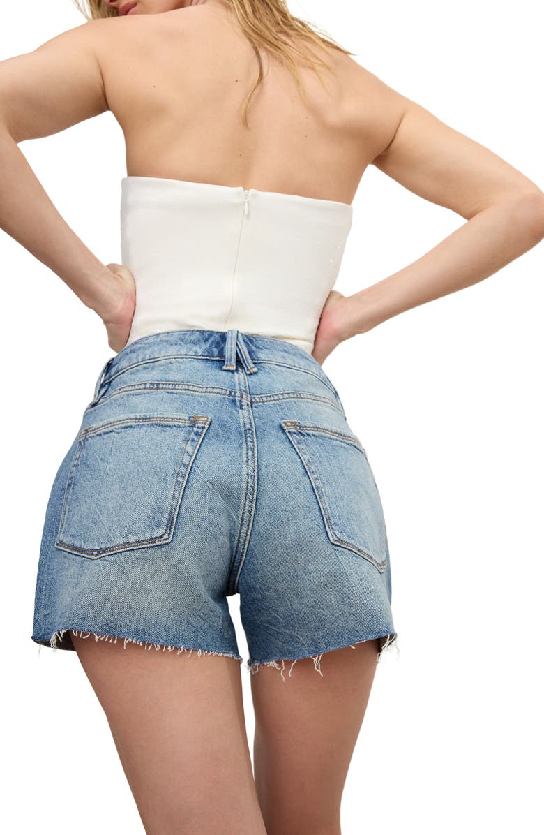 Good American Good Girlfriend Raw Hem Crossover Waist Denim Shorts, Alternate, color, Indigo804
