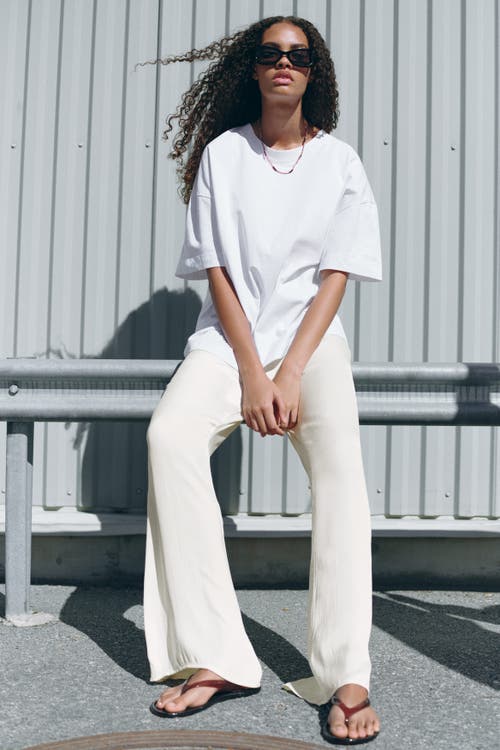 H&m Flared Satin Trousers In White