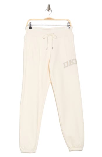 Dkny Rhinestone Arched Logo Joggers In Eggnog/pebble